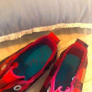 Red and black canvas sneakers